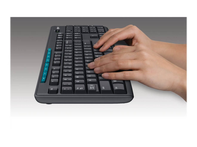 Copy Electronic vam predstavlja Tipkovnica Logitech K270 Wireless (HR)(P) [920-003738].Na fotografiji je crna tipkovnica postavljena je bočno i na tipkovnic su ženske ruke.