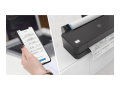 Copy electronic vam prtedstavlj Ploter HP DesignJet T230 24", 2025  Colour Ink-Jet A1, 2400x1200dpi 0.58 min/page USB LAN Wi-Fi [5HB07D#B19]. Na fotografiji je ploter a kraj njega je slika ženske ruke koja drži mobitel